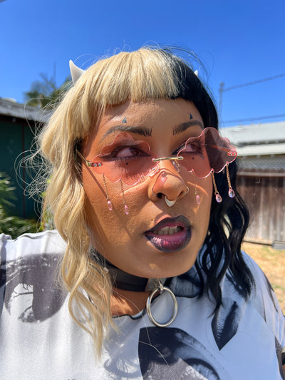 Pink Cloud Cries in Roller Skate Sunglasses