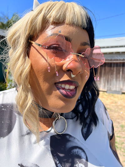 Pink Cloud Cries in Roller Skate Sunglasses
