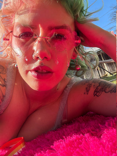 Pink Cloud Cries in Roller Skate Sunglasses